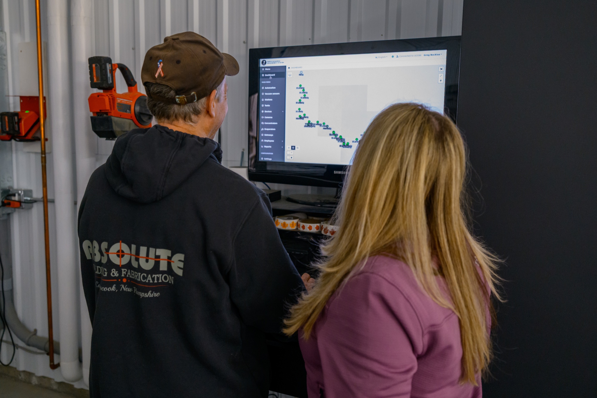 Greg and Lane reviewing the sap line monitoring dashboard